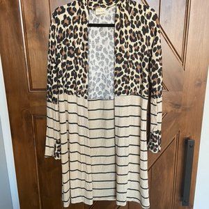 Brand new, never worn, leopard and striped duster